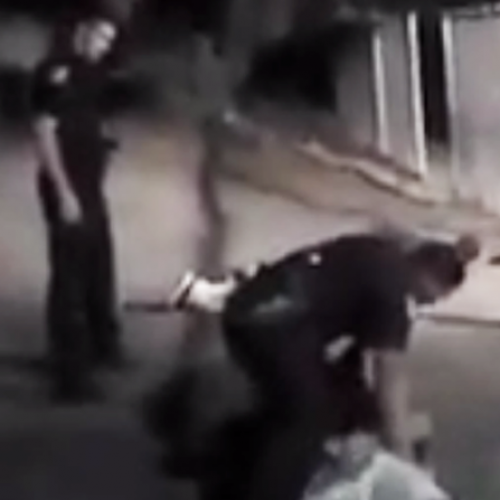 Officer Beats and Kicks Handcuffed Military Veteran, Drags His Body Through the Dirt (Video)