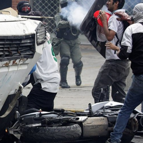 Graphic Video: Armored Vehicle Runs Over Protesters in Venezuela