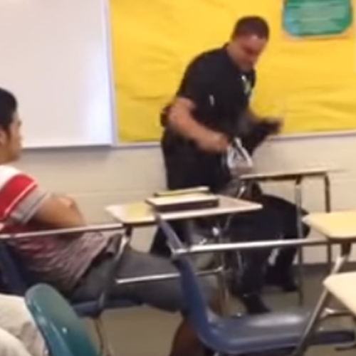 Cop Violently Attacks Child at School