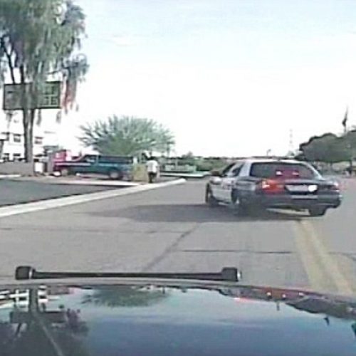 WATCH: Arizona Cop Mounts Sidewalk and Smashes Into Suspect
