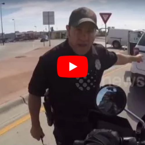 WATCH: Denver Police Officer Threatens to Give Motorcyclist Ticket For Honking Horn
