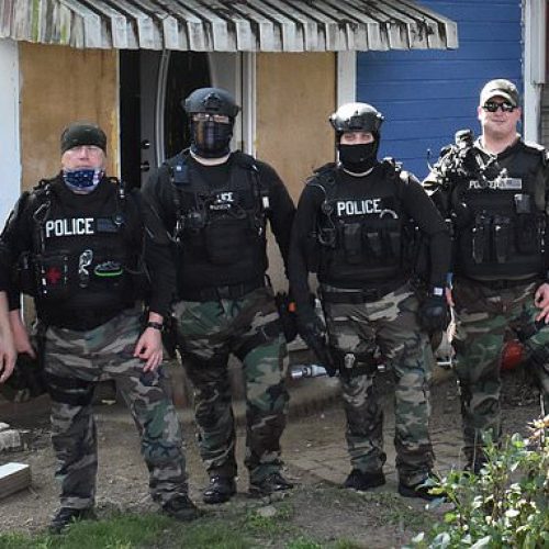 Alabama Officers Suspended Over Alleged ‘Hoax’ White Power Hand Gesture In Photo