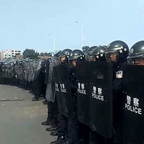 Thousands of Chinese Army Veterans March Over Police Beatings